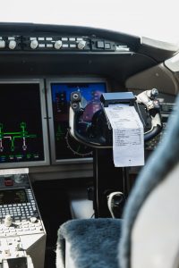 Bombardier Challenger 300 N300WK pilot instrument panel and navigation displays supporting executive aviation flight operations.